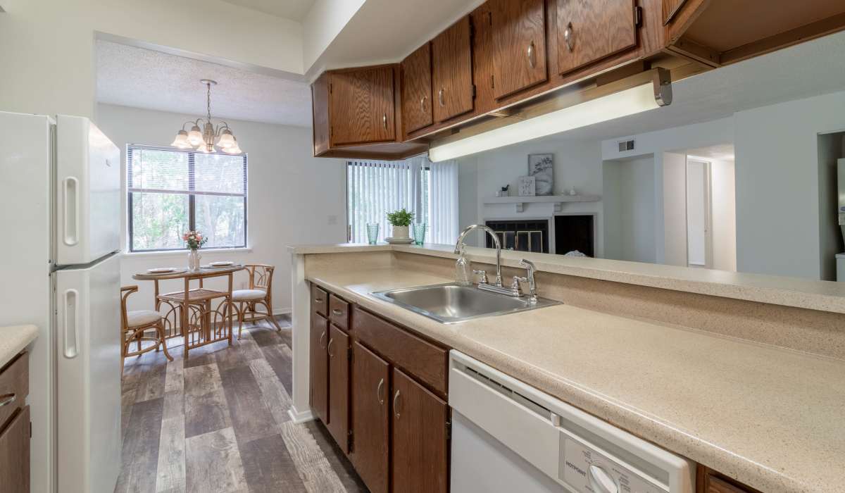 Kitchen and dining area at Tanglewood Apartments in Southern Pines, North Carolina