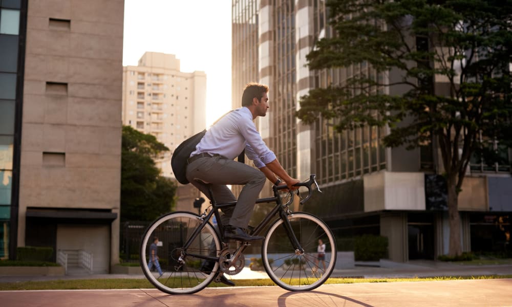 Resident biking to work at his downtown office near Oaks Hiawatha Station in Minneapolis, Minnesota