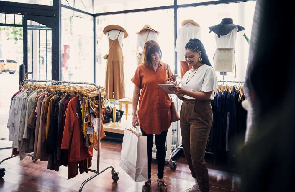 Resident shopping near Birch Tree Apartments in Lansing, Michigan