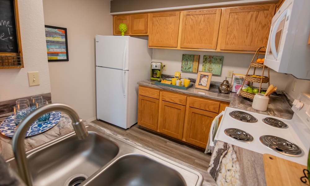 An apartment kitchen at Crown Pointe Apartments in Oklahoma City, Oklahoma