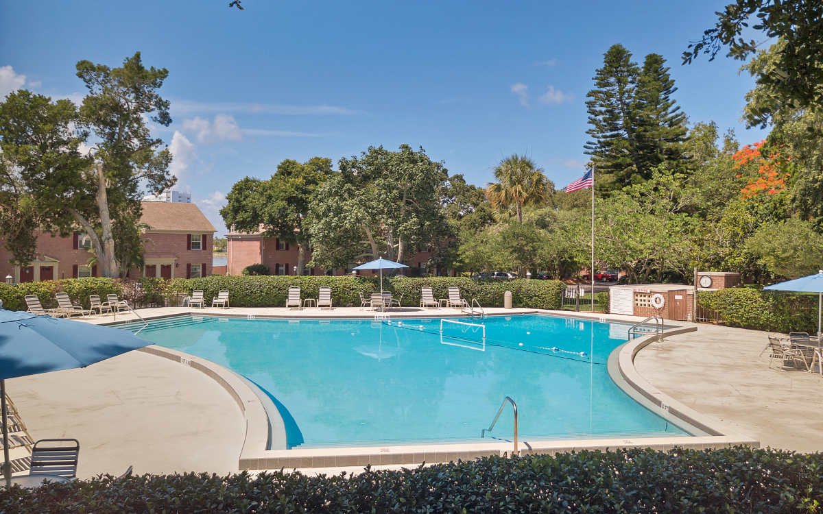 Swimming pool with lounge seating at Carlton Arms Of St. Petersburg in St Petersburg, Florida 
