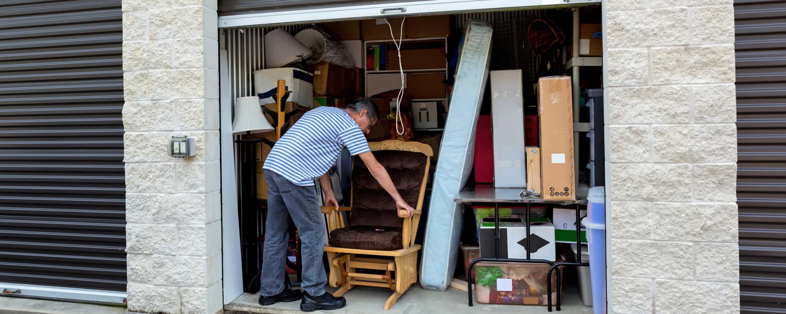 A man putting stuff to his self-storage at Railroad Avenue Self Storage, Suisun City, California