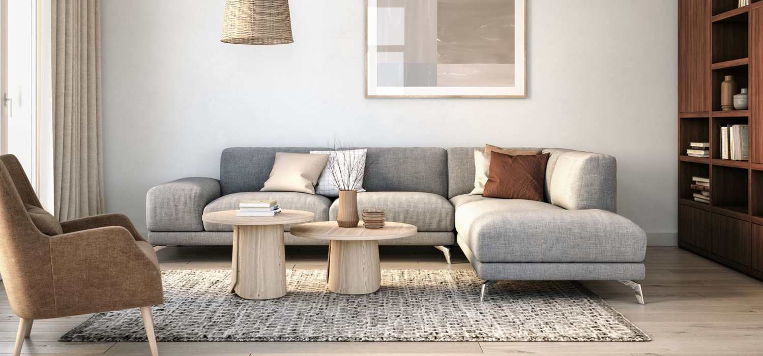 Comfortable living room with a couch and coffee table at Fawn Haven Apartments in Butler, Indiana