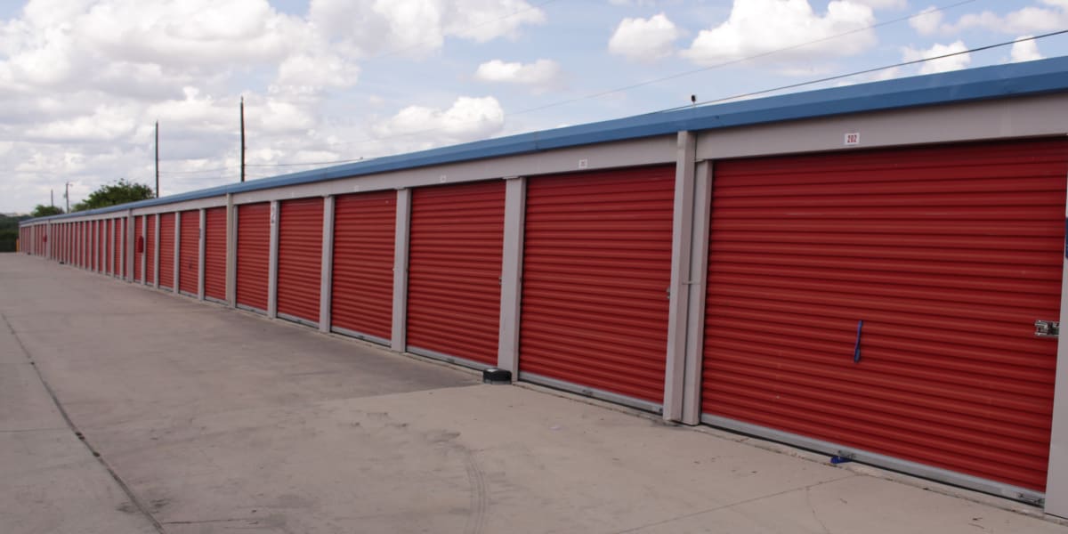 A row of drive-up self storage units at Avid Storage in San Antonio, Texas