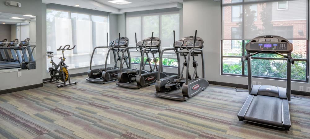 Indoor gym with workout equipment at Crossings at Olde Towne in Gaithersburg, Maryland