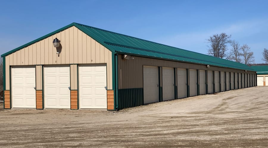 Storage units with blue doors and locks at KO Storage in Pillager, Minnesota
