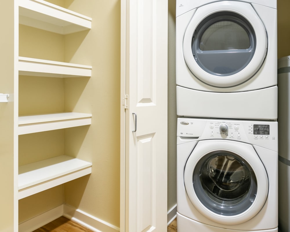 Washer and dryer and custom shelving at The Meridian in Salem, Oregon