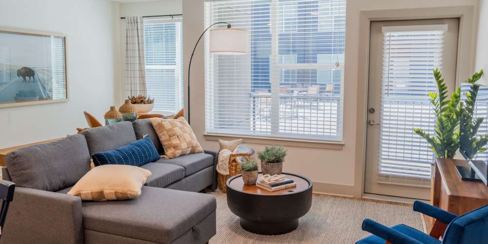 Living room with ambient lighting at Legends 267 Apartments in Kansas City, Kansas