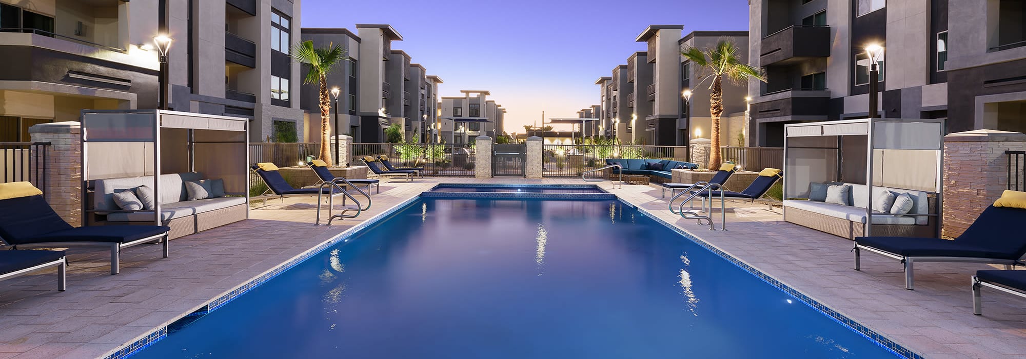 Resort-style swimming pool at Aviva Goodyear in Goodyear, Arizona