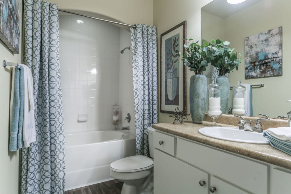 Luxurious bathroom with ample counter space at Amalfi at Tuscan Lakes in League City, Texas
