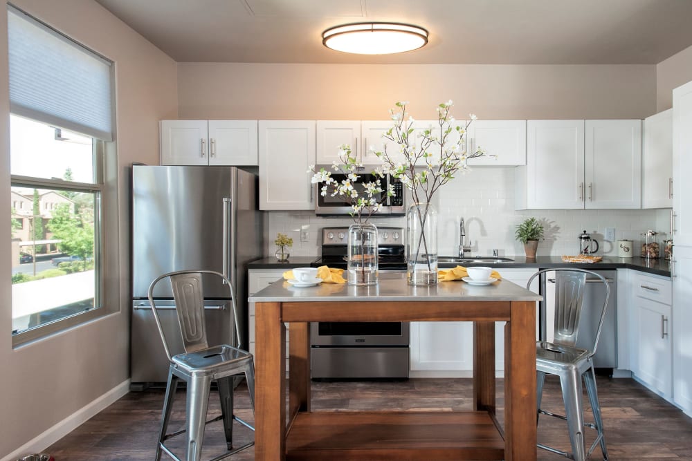 Beautiful, gourmet kitchen in a model home at Venu at Galleria Condominium Rentals in Roseville, California