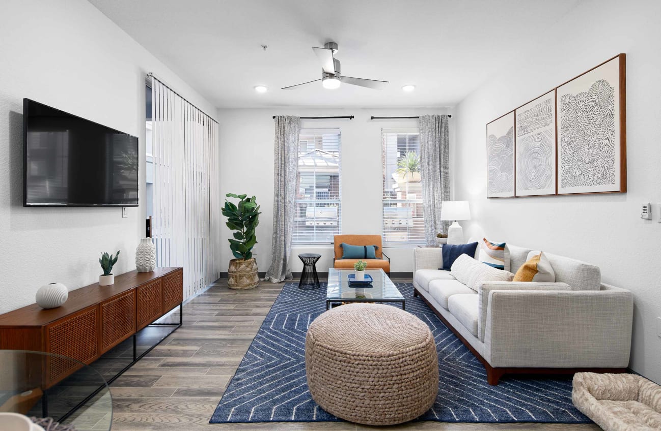 Furnished apartment living area shown at Citi on Camelback.