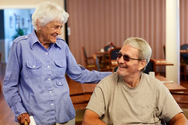 Happy residents enjoying conversation at Dayspring Villa