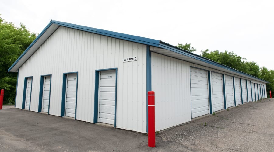 Storage units with blue doors and locks at KO Storage of Maple Lake - Cenex in Maple Lake, Minnesota