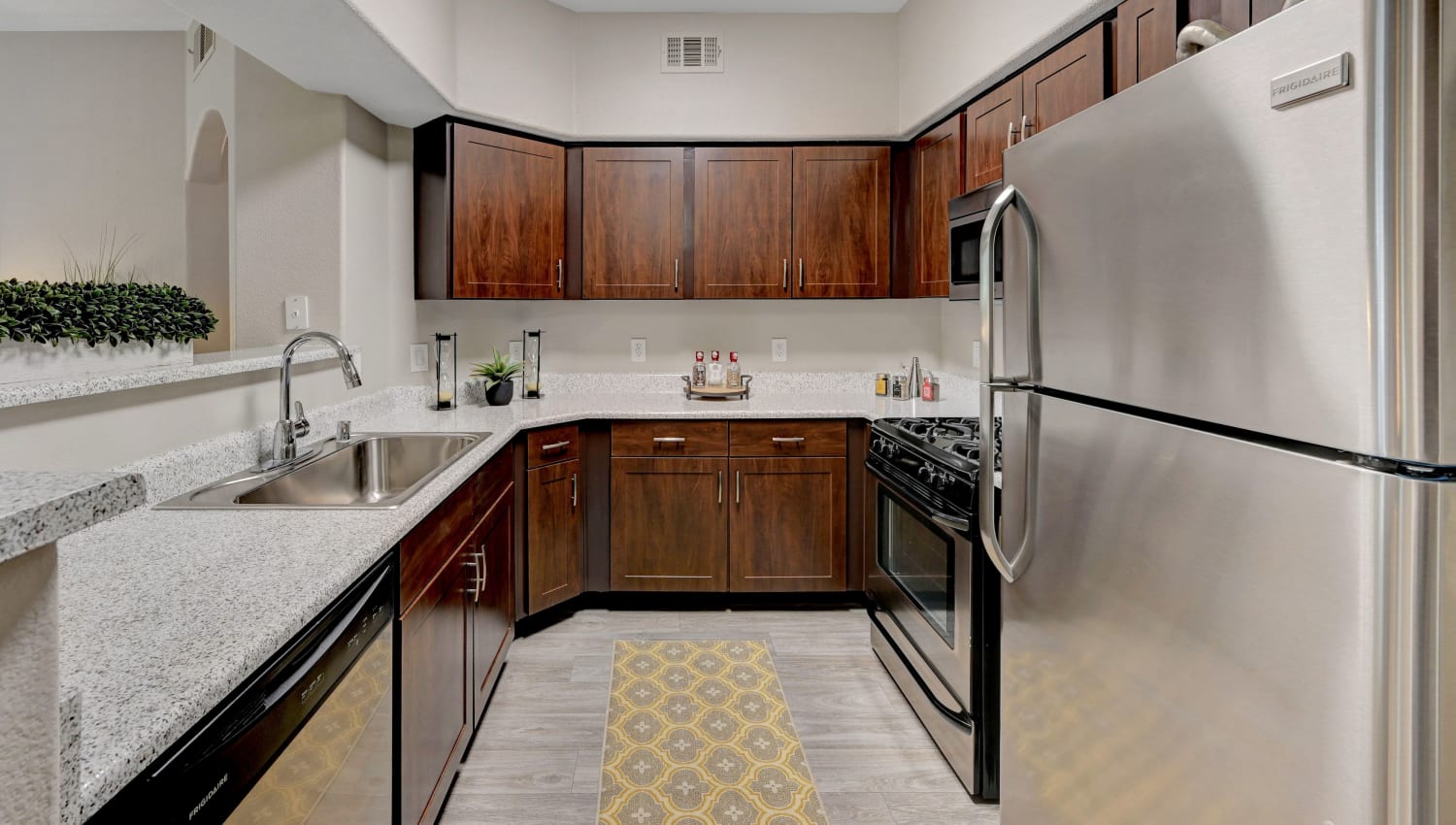 Model kitchen with lots of counter space at Canyon Villas Apartments in Las Vegas, Nevada