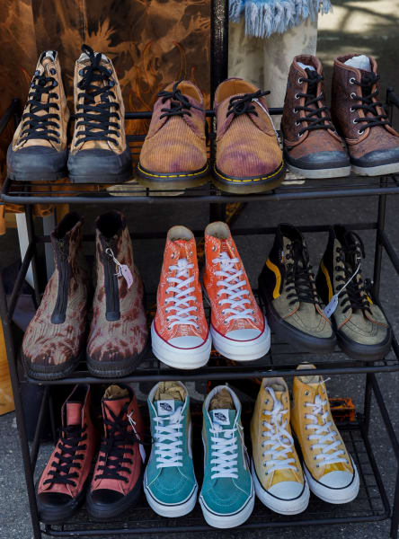 a variety of boots and shoes