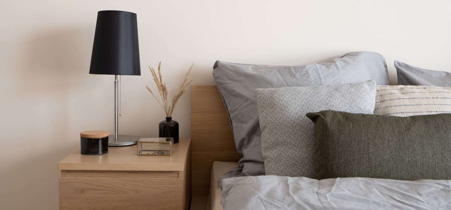 Apartment bedroom with a comfortable bed at Northchase in Alvarado, Texas