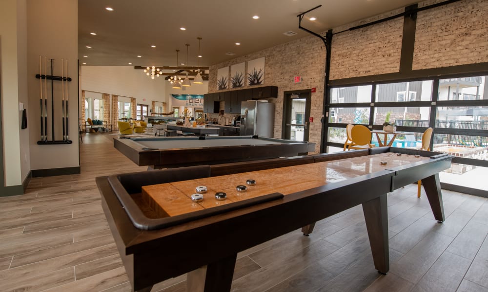 Game area at Bend at New Road Apartments in Waco, Texas