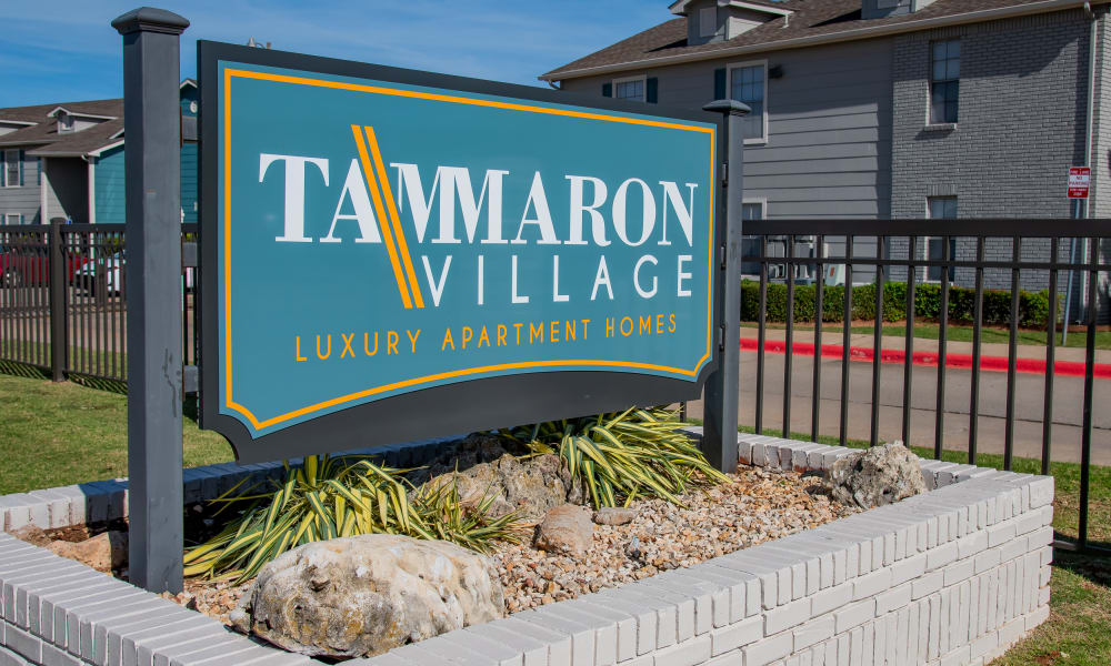 The sign in front of Tammaron Village Apartments in Oklahoma City, OK