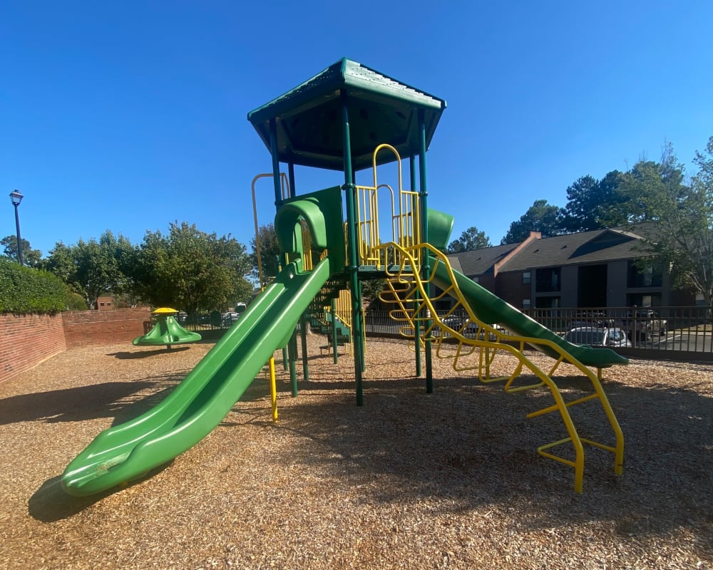 Kids play area outside of Greenleaf Apartments in Phenix City, Alabama