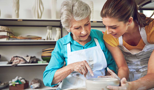 A resident and her daughter baking at Amaran Senior Living in Albuquerque, New Mexico. 