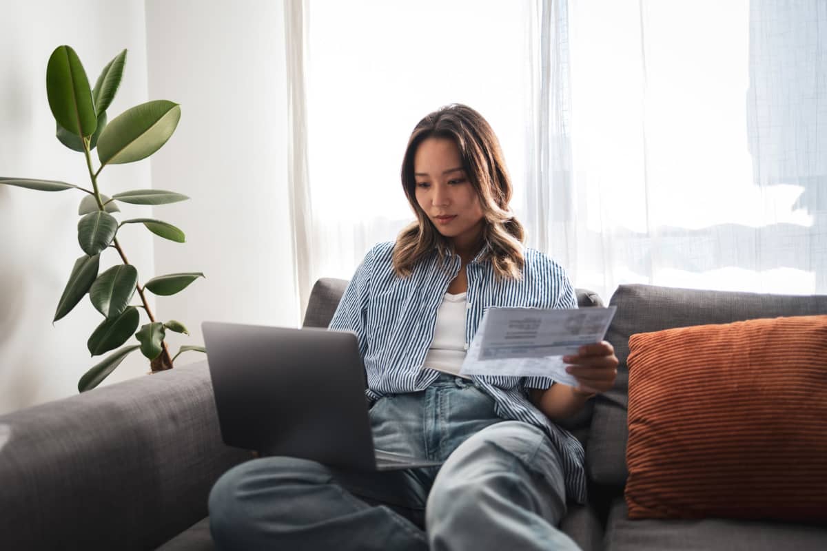 Resident using internt in her apartment at Alston Arms Apartments in North Charleston, South Carolina