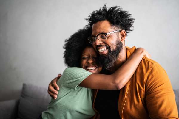 Residents hugging at Casa Aliento in Oxnard, California