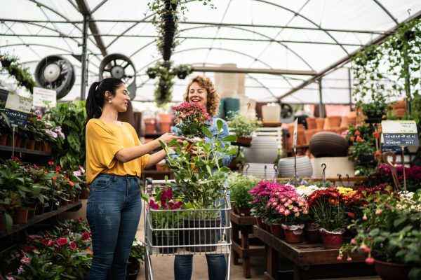 Residents shopping at a plant nursery near Delta View Apartments in Antioch, California