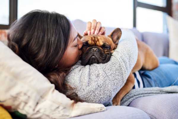 Happy resident and her pup at Sierra Vista Apartments in Reno, Nevada     