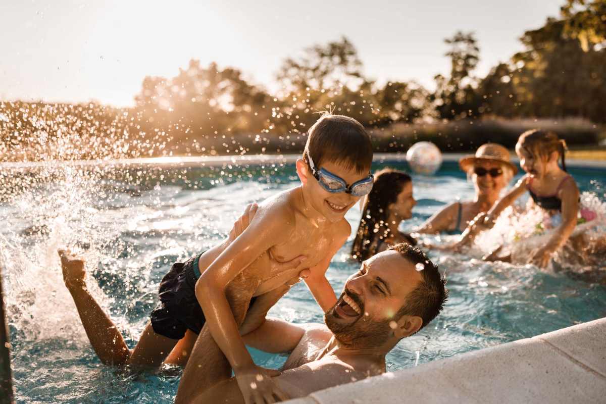 Residents having a good time in the swimming pool at Azalea Park I and II in Meridian, Mississippi