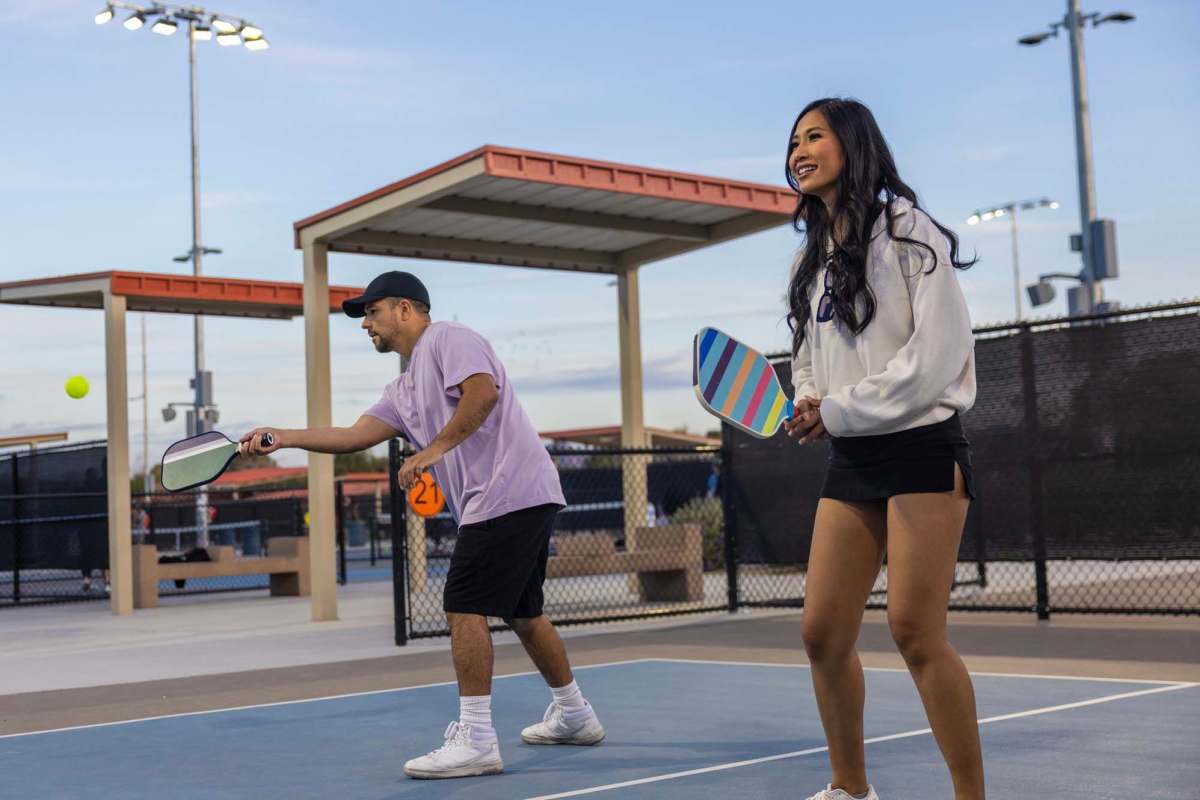 Residents playing pickleball near Wild Rose Flats in Phoenix, Arizona