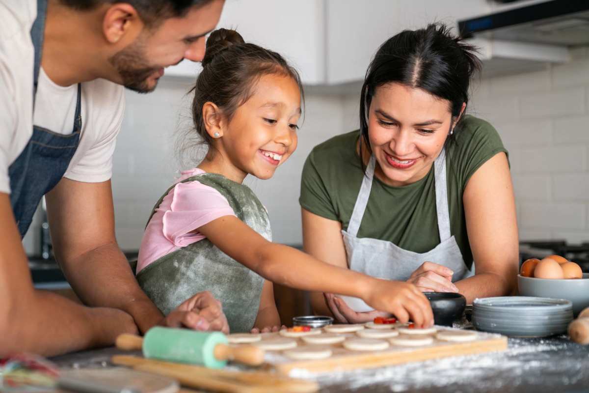 Resident cooking in their apartment at Pembroke Villas Apartments in Pembroke Park, Florida