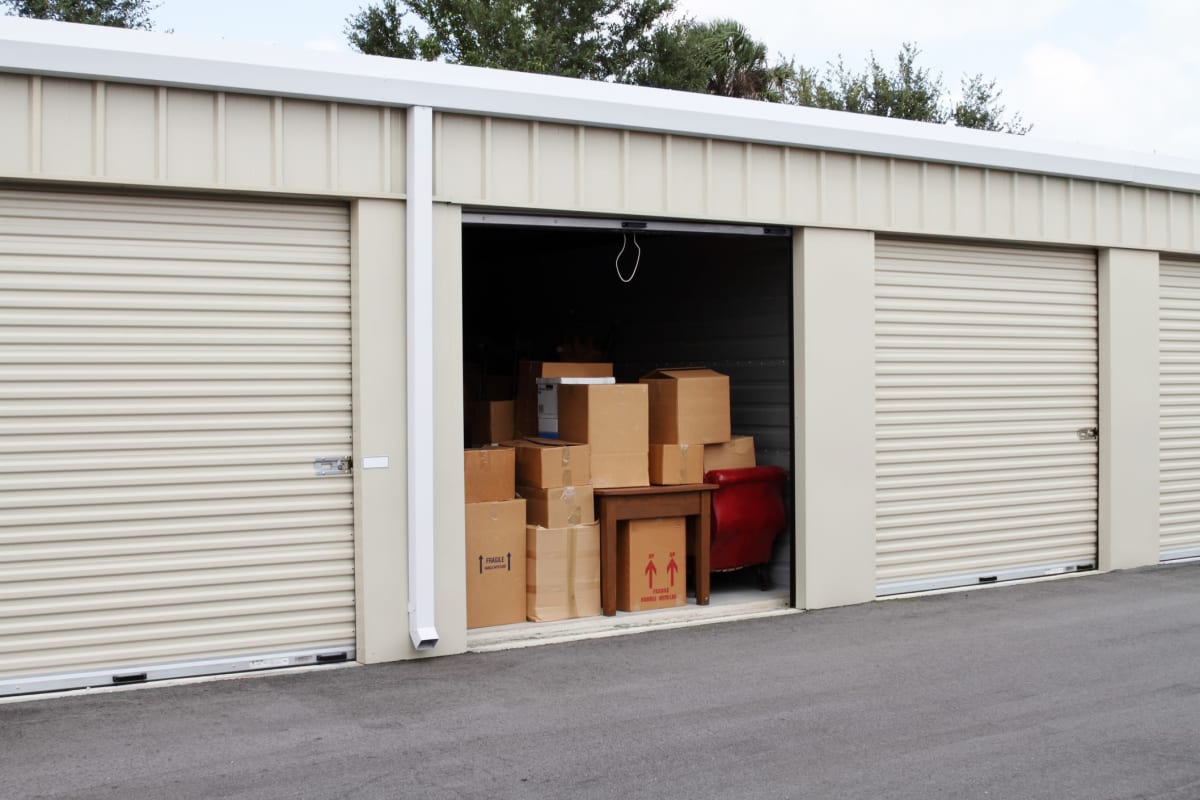 A storage unit with boxes at Red Dot Storage in Lansing, Michigan