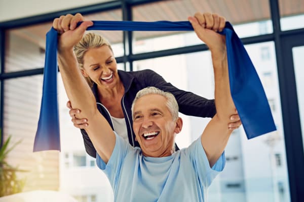 Resident working with a physical trainer at York Gardens in Edina, Minnesota