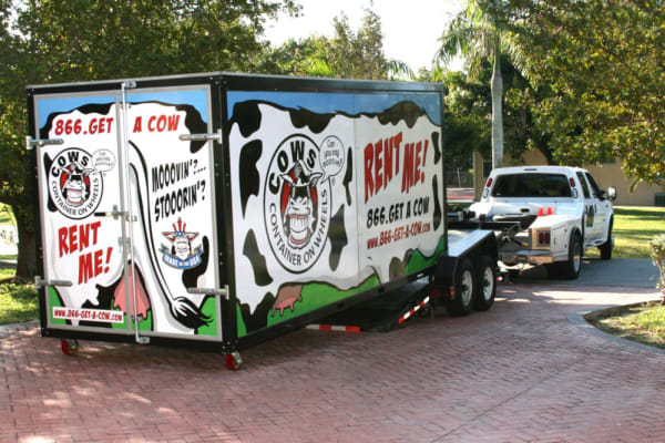 Moving truck attached to a customers truck at Dade City Self Storage in Dade City, Florida