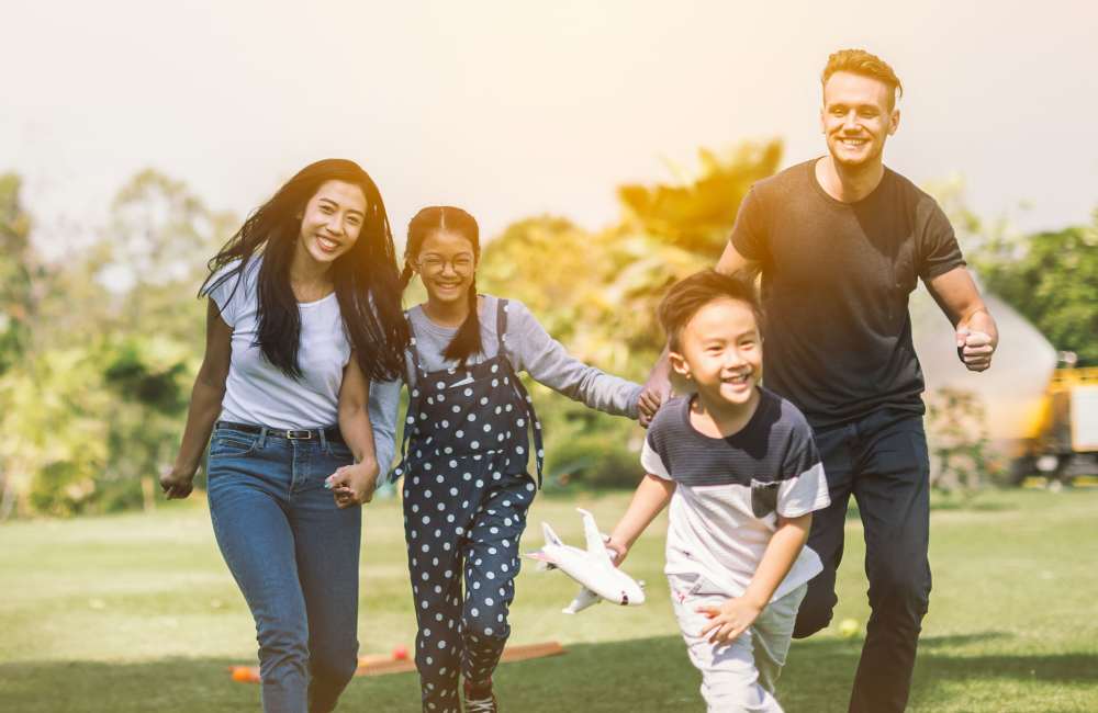 Resident family in the park near Walnut Grove Landing Apartments in Vancouver, Washington