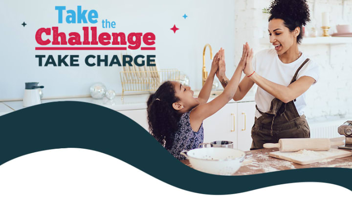 Take the Challenge logo and picture of mother and daughter cooking. 