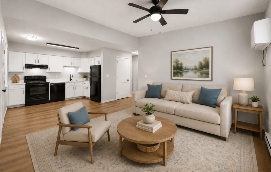 A spacious living room with modern furniture at Park @ Nine23 in Cedar Falls, Iowa