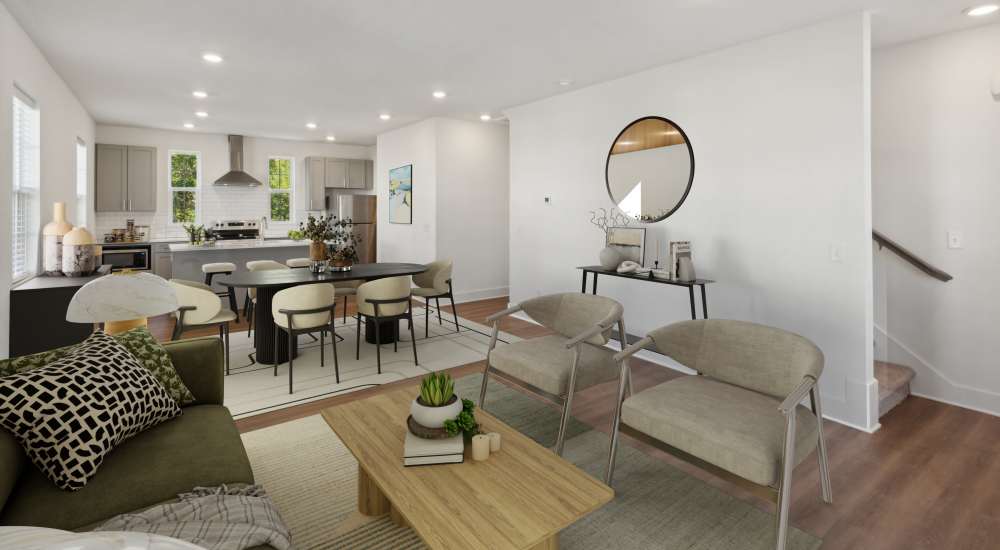 Cozy couch in a living room with a large rug at The Rowan in Antioch, Tennessee.