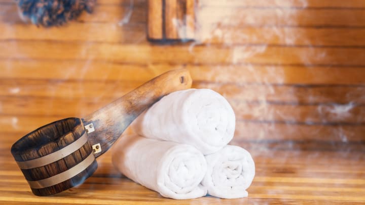 steaming hot towels in a sauna | spas in Gilbert 