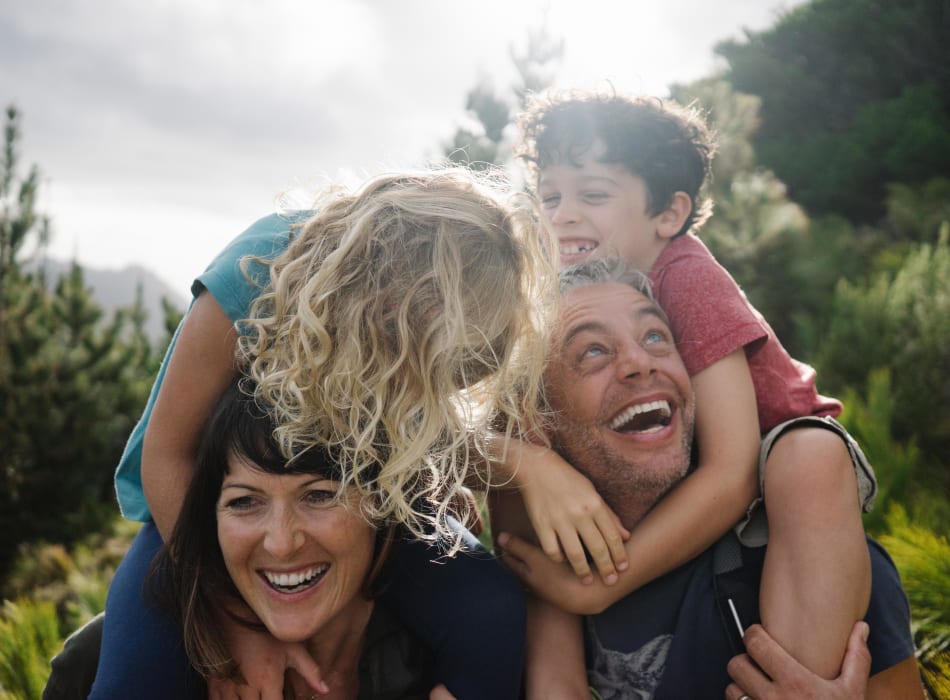 Resident family enjoying a local activity in the park near Sofi Belmar in Lakewood, Colorado