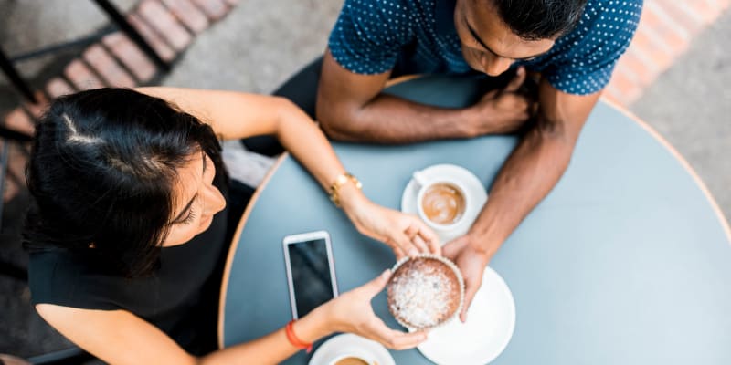 Residents out for coffee near Hamilton Springs Apartments in Baltimore, Maryland