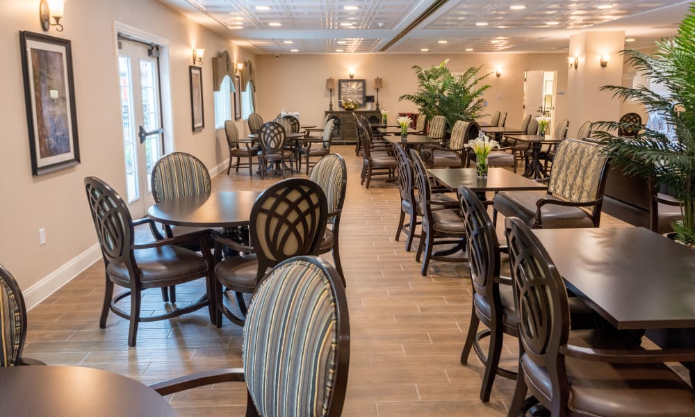 Resident dining room at Inspired Living at Royal Palm Beach in Royal Palm Beach, Florida
