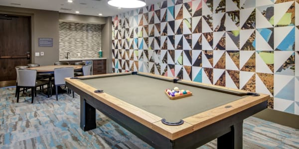 Clubhouse lounge and pool table at The Residences at Annapolis Junction in Annapolis Junction, Maryland