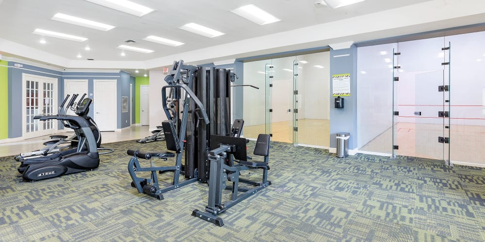 Fitness center and racquetball court at Weston Place Apartments in Weston, Florida
