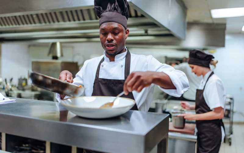 Chef cooking meals at Grand Villa of Ocala in Ocala, Florida