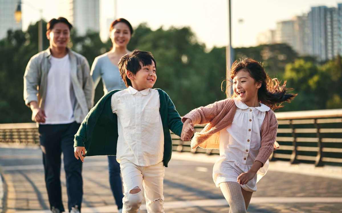 A resident family joyfully exploring surroundings together near Pine View in La Pine, Oregon