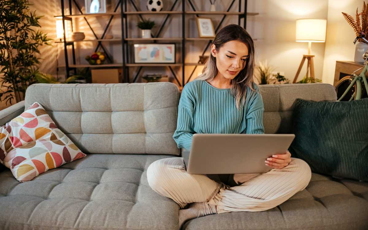 Resident working from home, showcasing a blend of relaxation and productivity at Golden Villas in San Diego, California