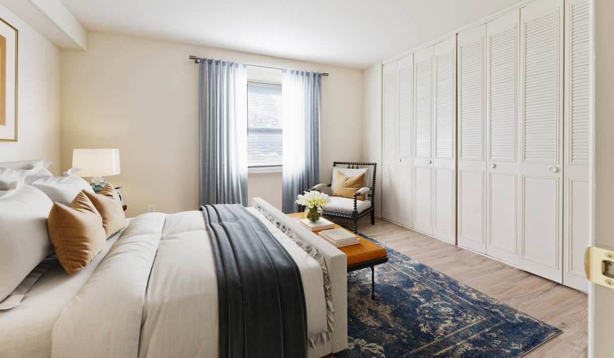 Bedroom with dark furniture at Misty Pines Apartments in Ashland, Virginia