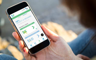 Resident using their phone to sign up for Rewards at The Park at Research Forest